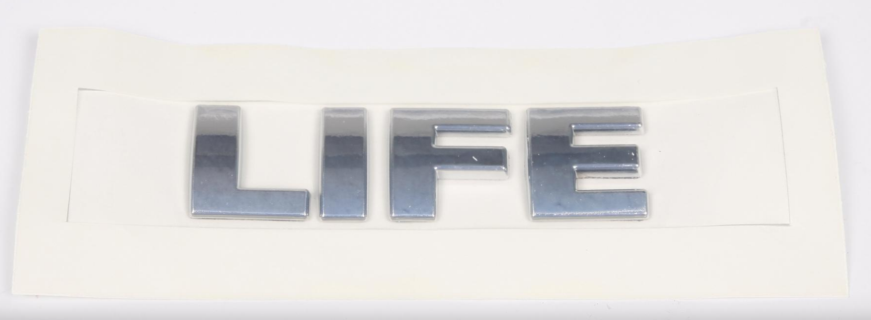 Надпись "Life" VW Caddy 03- (для задней двери) (хром)